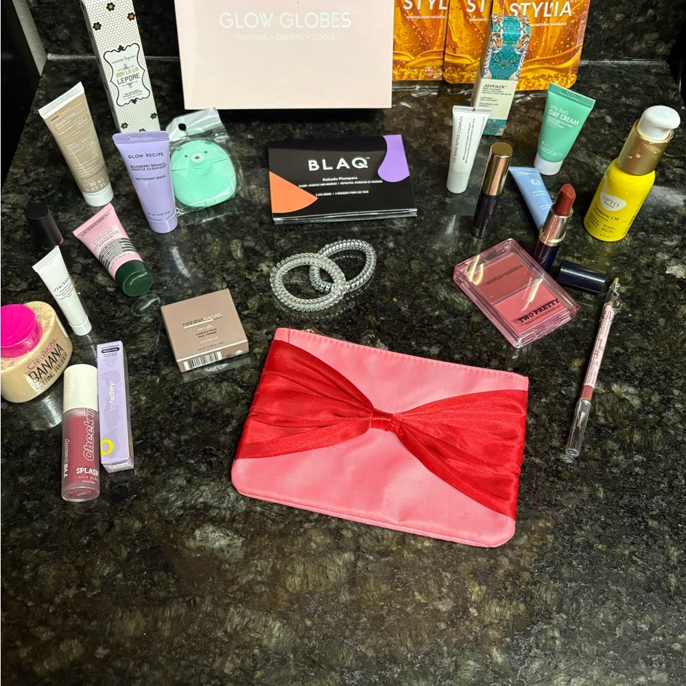 NWOT Mystery Pink and Red Bow Makeup Bag with Assorted Cosmetics